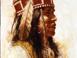 Portrait of an Mescalero Apache wearing a red hat