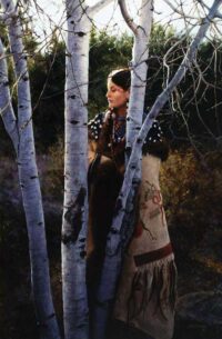 Painting of young Crow girls seeking guidance, comfort and wisdom from The Aspen Trees