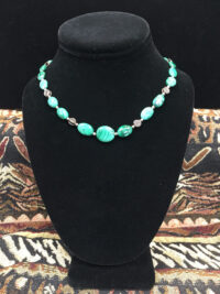 Malachite with Silver Circle of Life beads, is a necklace for sale.