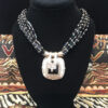 6 Line Onyx Necklace with Square Pipe Pendant for sale.