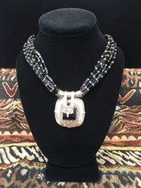 6 Line Onyx Necklace with Square Pipe Pendant for sale.