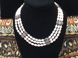 Pale pink pearl collar for sale.